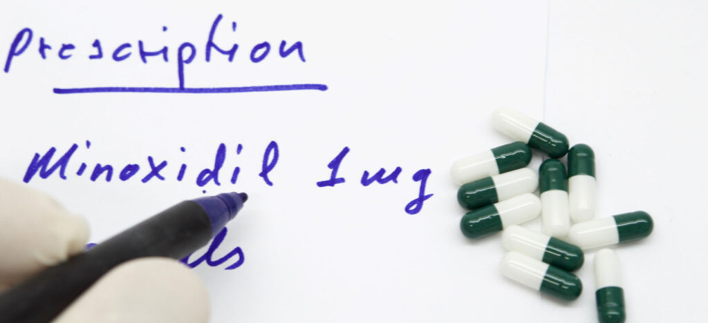 Minoxidil. Use, side effects